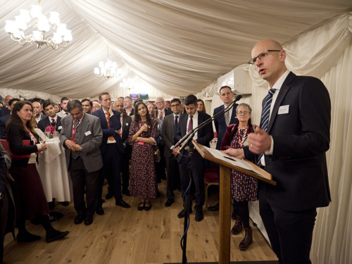 Olivier making speech at reception.jpg