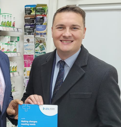 Wes Streeting holding the NPA's vision document