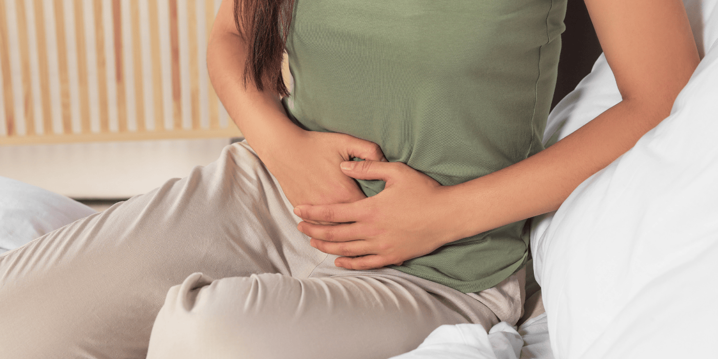 Woman holding bladder