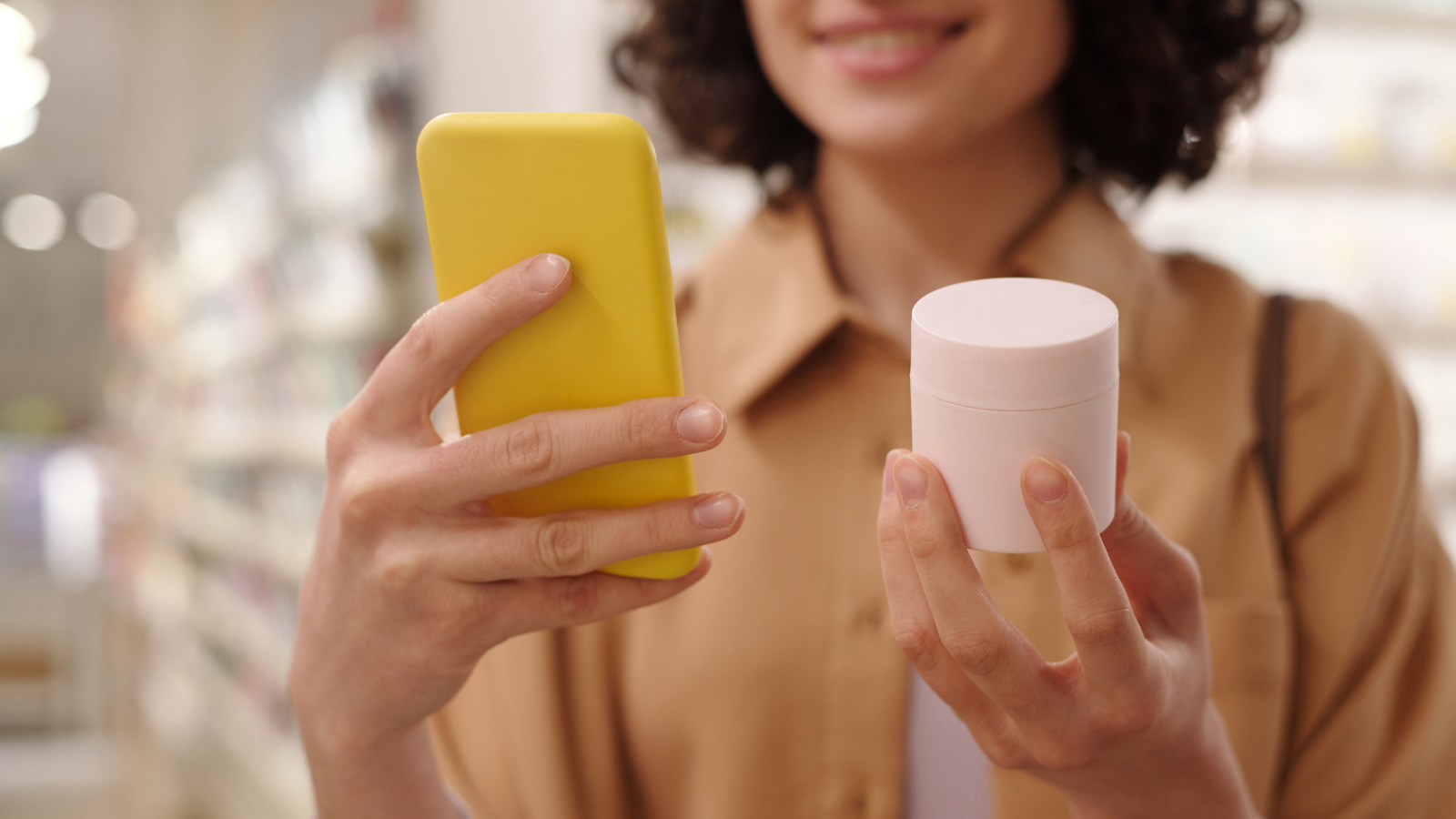 Customer with phone and product