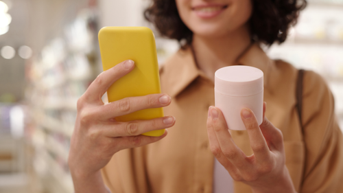 Customer with phone and product
