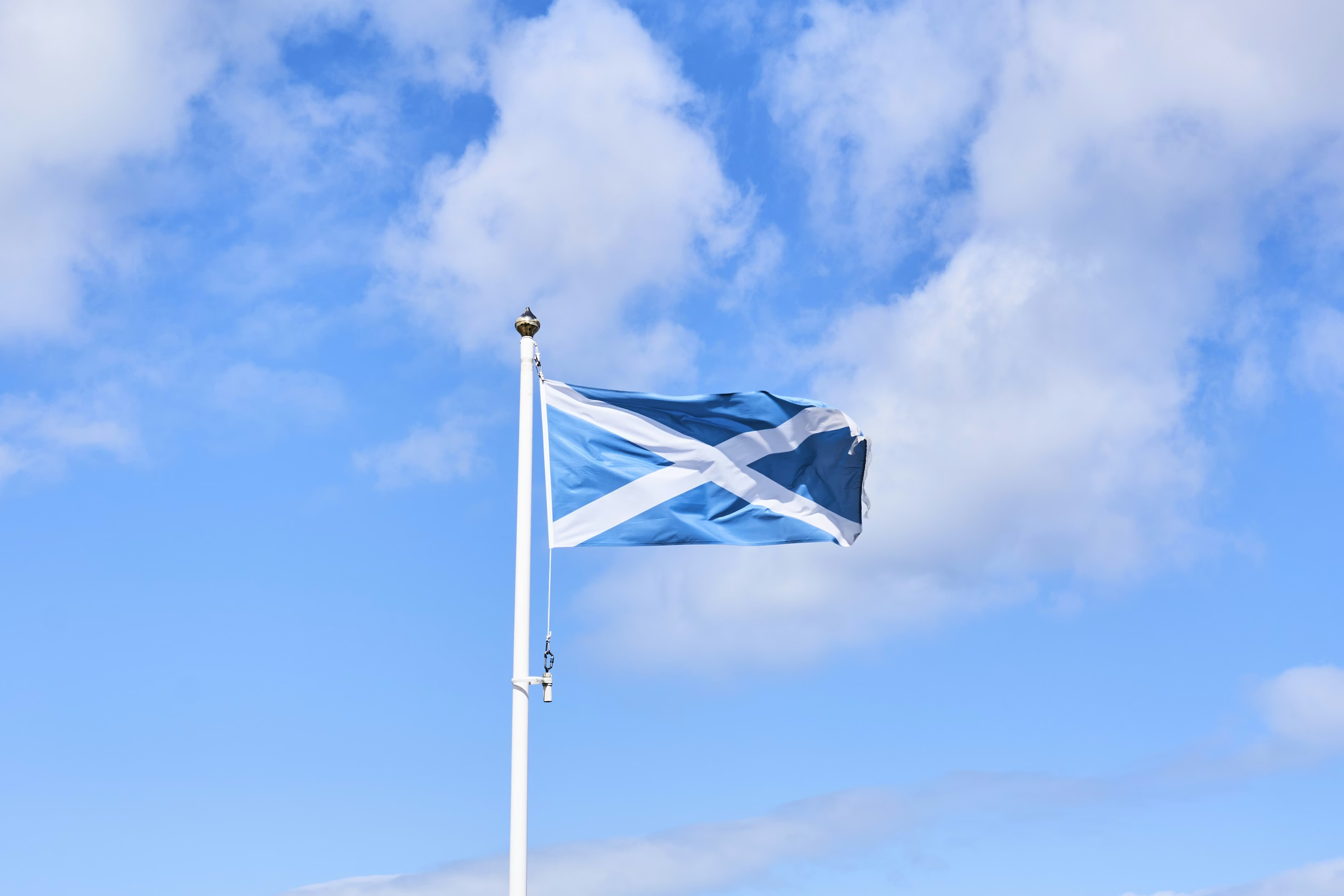 A saltaire flag flying in the wind